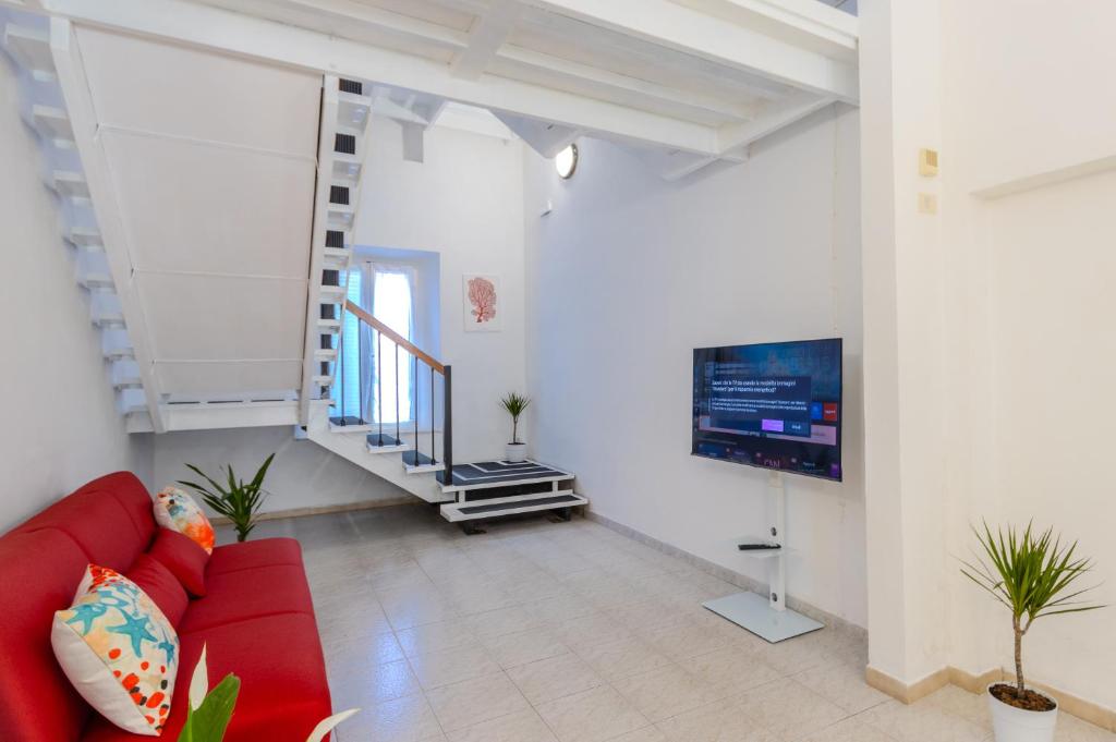 TV a/nebo společenská místnost v ubytování Hotel Corallo Follonica