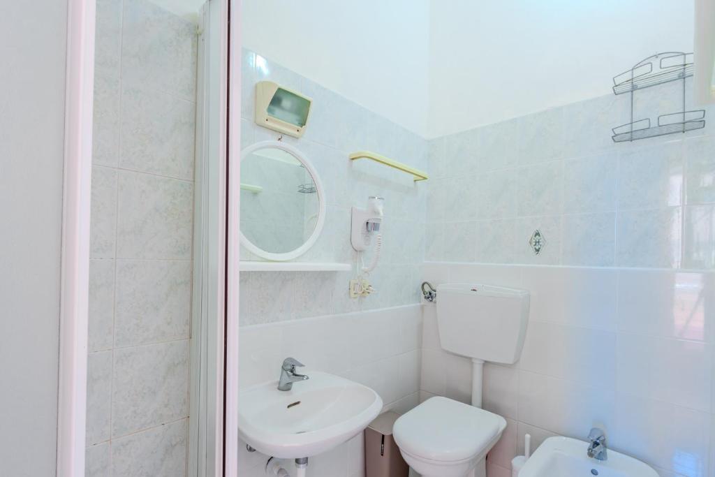 Koupelna v ubytování Hotel Corallo Follonica
