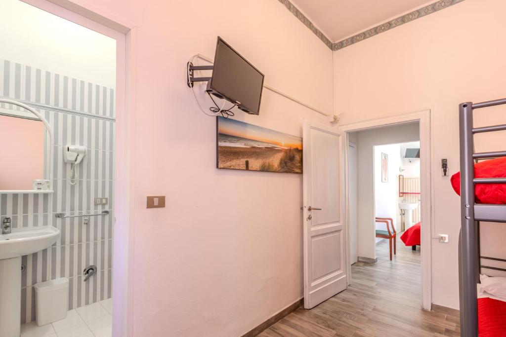 TV a/nebo společenská místnost v ubytování Hotel Corallo Follonica