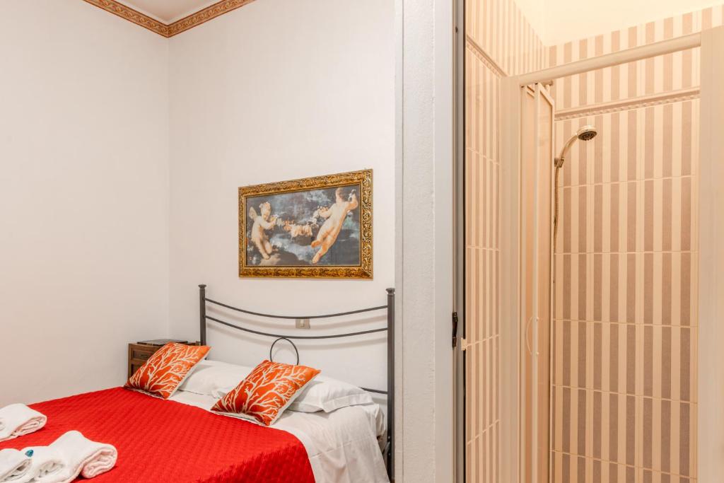Postel nebo postele na pokoji v ubytování Hotel Corallo Follonica