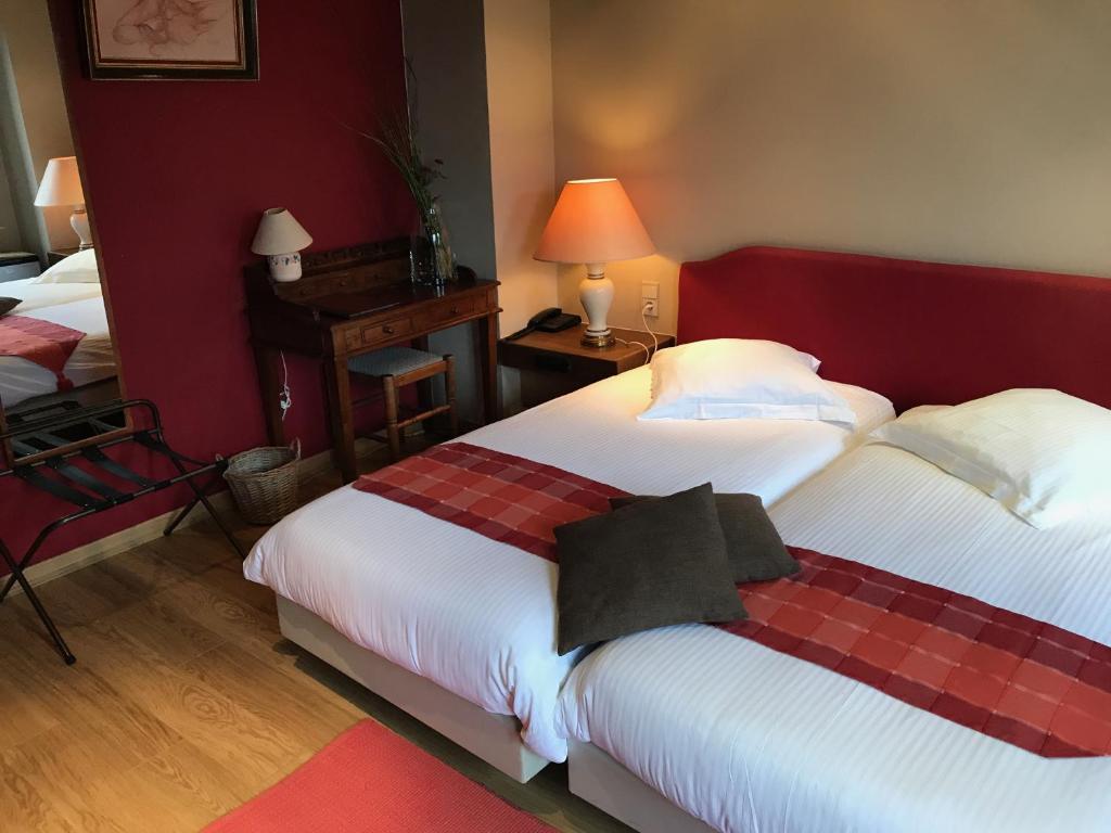 Postel nebo postele na pokoji v ubytování Hotel Cosy Bouillon