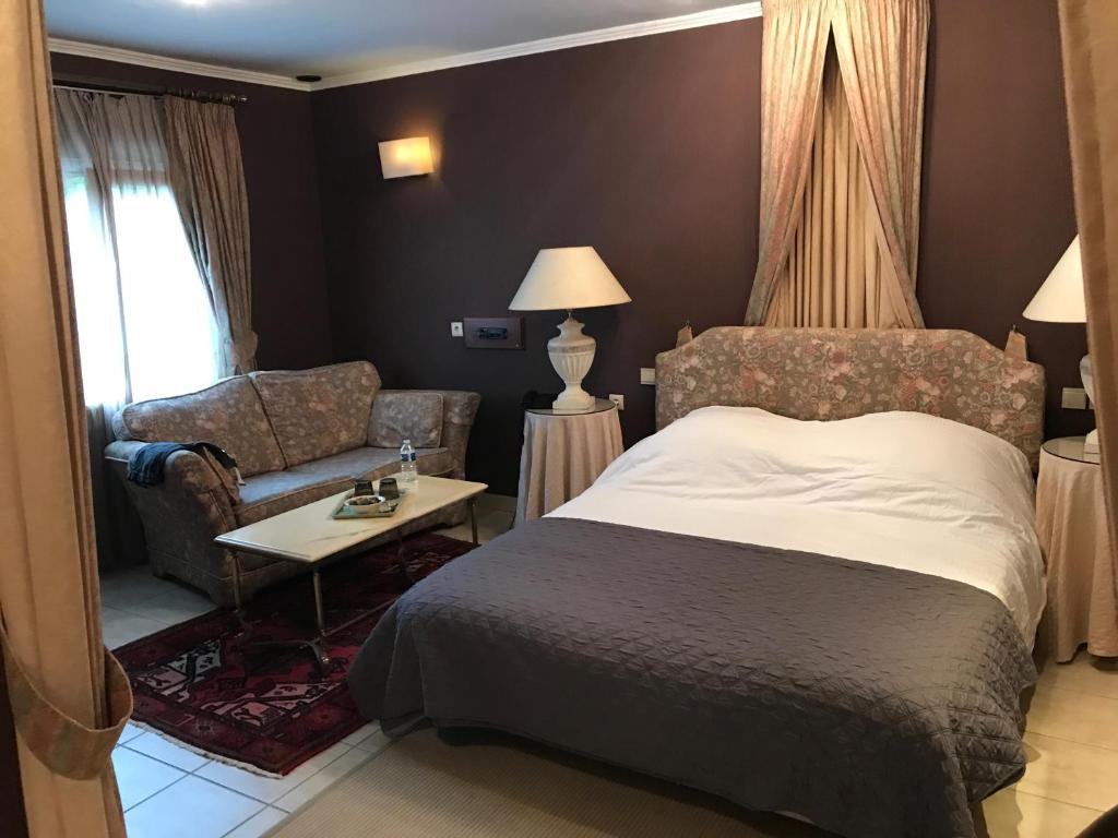 Postel nebo postele na pokoji v ubytování Hotel Cosy Bouillon