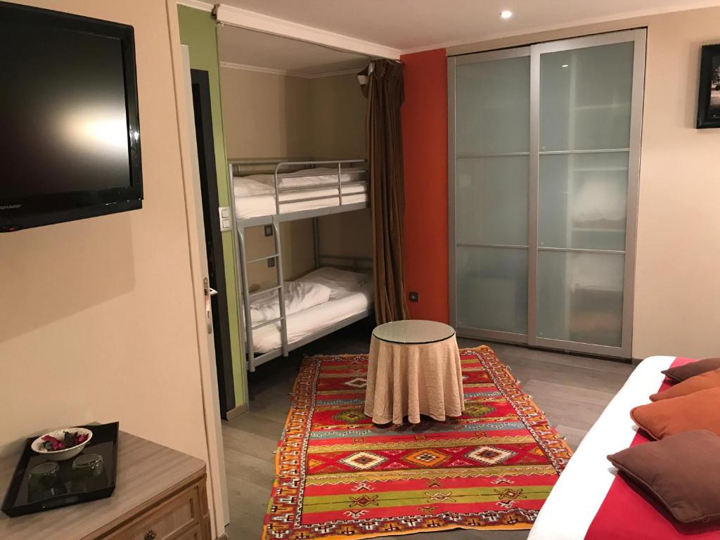 Postel nebo postele na pokoji v ubytování Hotel Cosy Bouillon