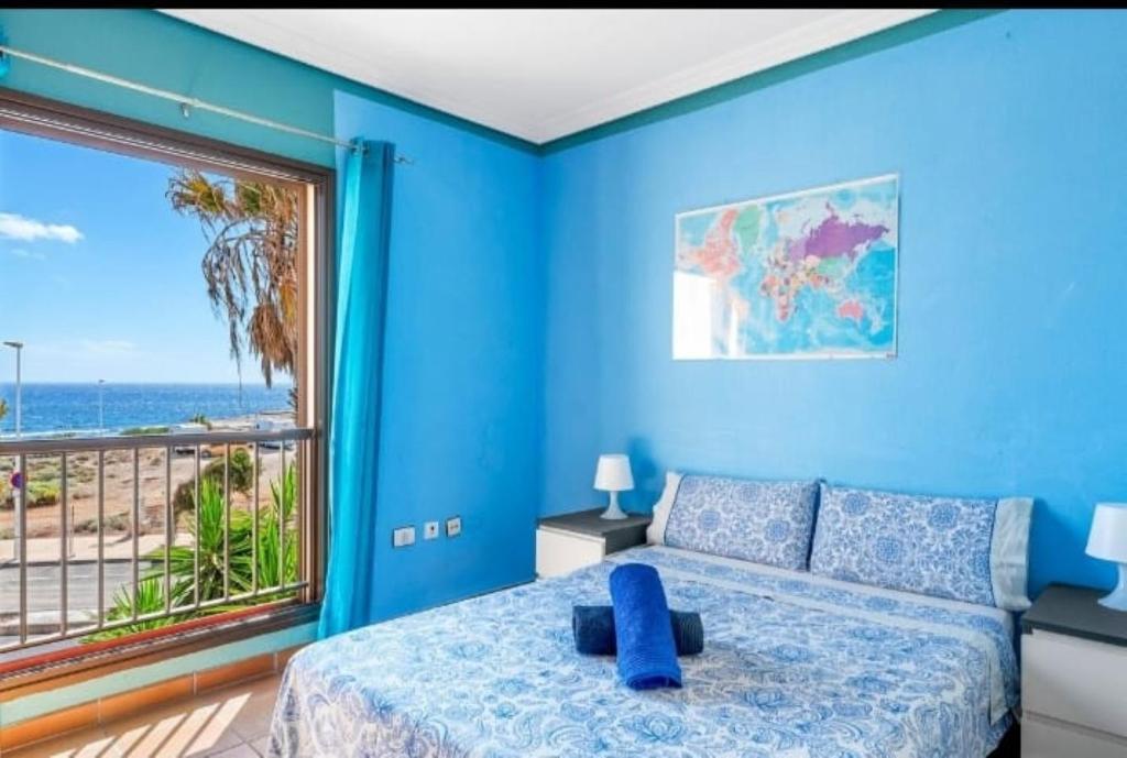 Postel nebo postele na pokoji v ubytování Let's go to the beach