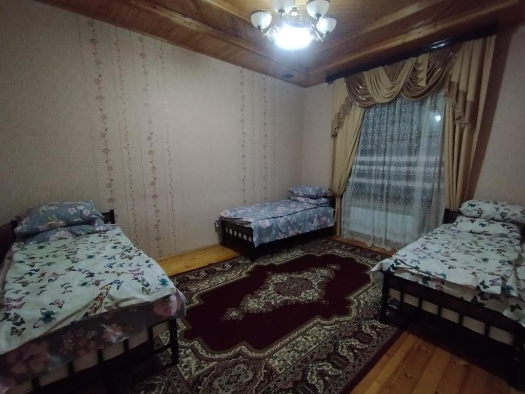 Postel nebo postele na pokoji v ubytování Piran Garden