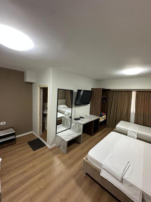 Postel nebo postele na pokoji v ubytování Hotel HER