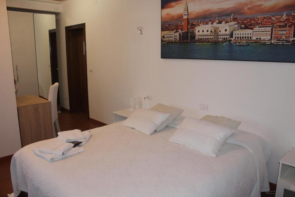 Postel nebo postele na pokoji v ubytování B&B Airport Venice Diego 2