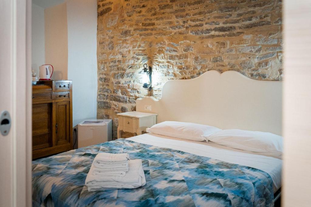 Postel nebo postele na pokoji v ubytování mille e una notte