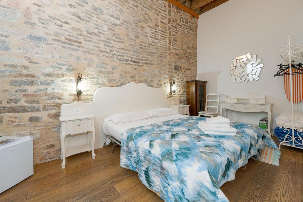 Postel nebo postele na pokoji v ubytování mille e una notte