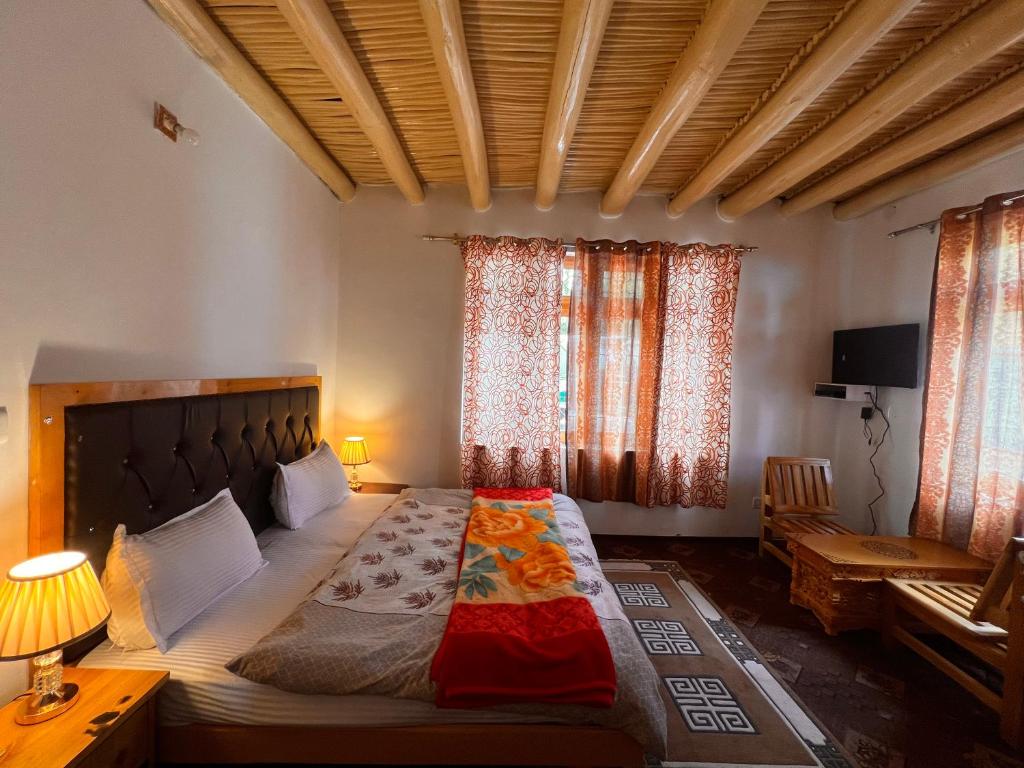 Postel nebo postele na pokoji v ubytování Sky land guest house
