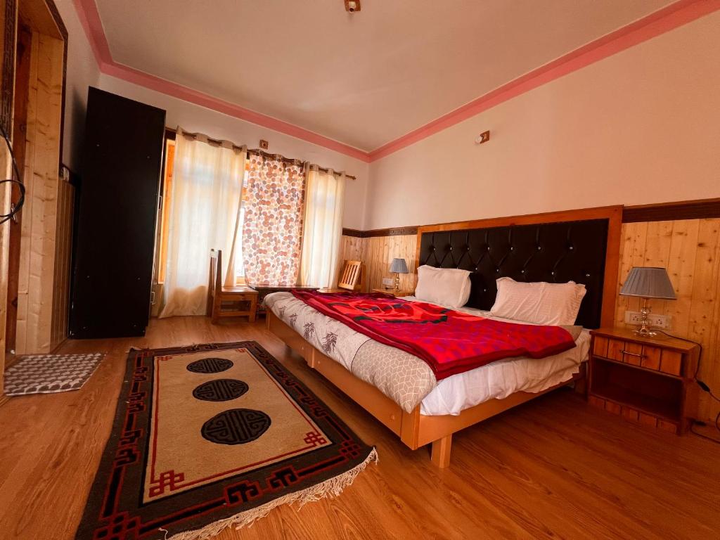 Postel nebo postele na pokoji v ubytování Sky land guest house