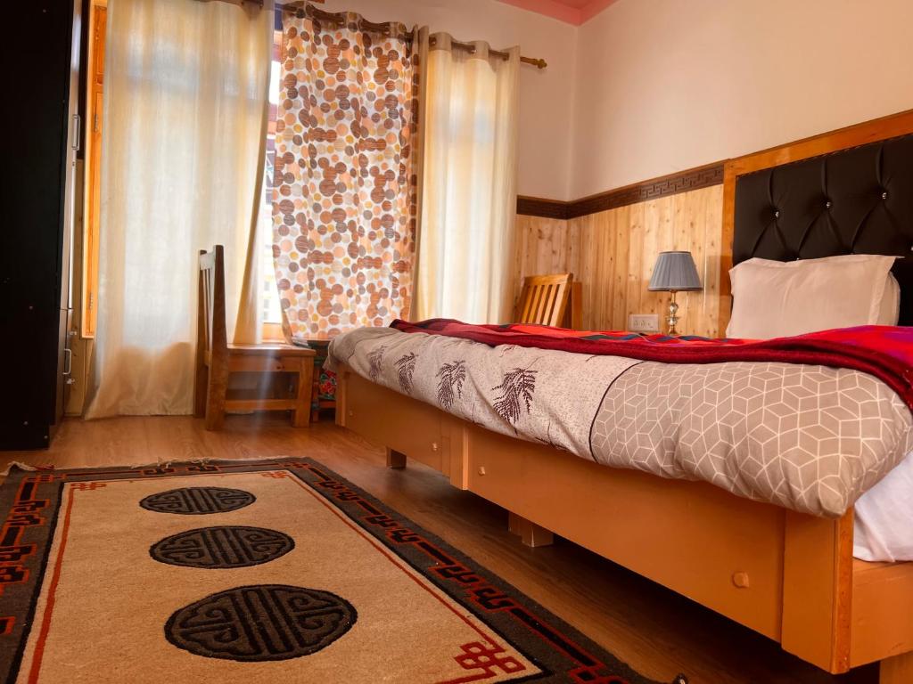 Postel nebo postele na pokoji v ubytování Sky land guest house