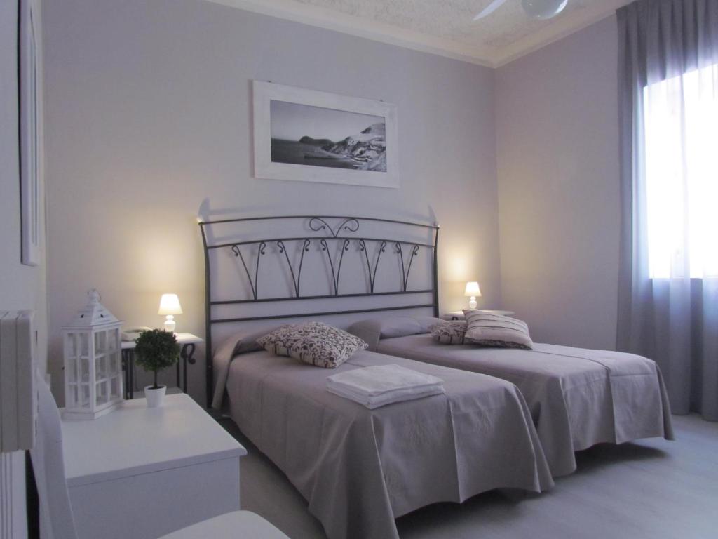 Postel nebo postele na pokoji v ubytování Hotel Odissea