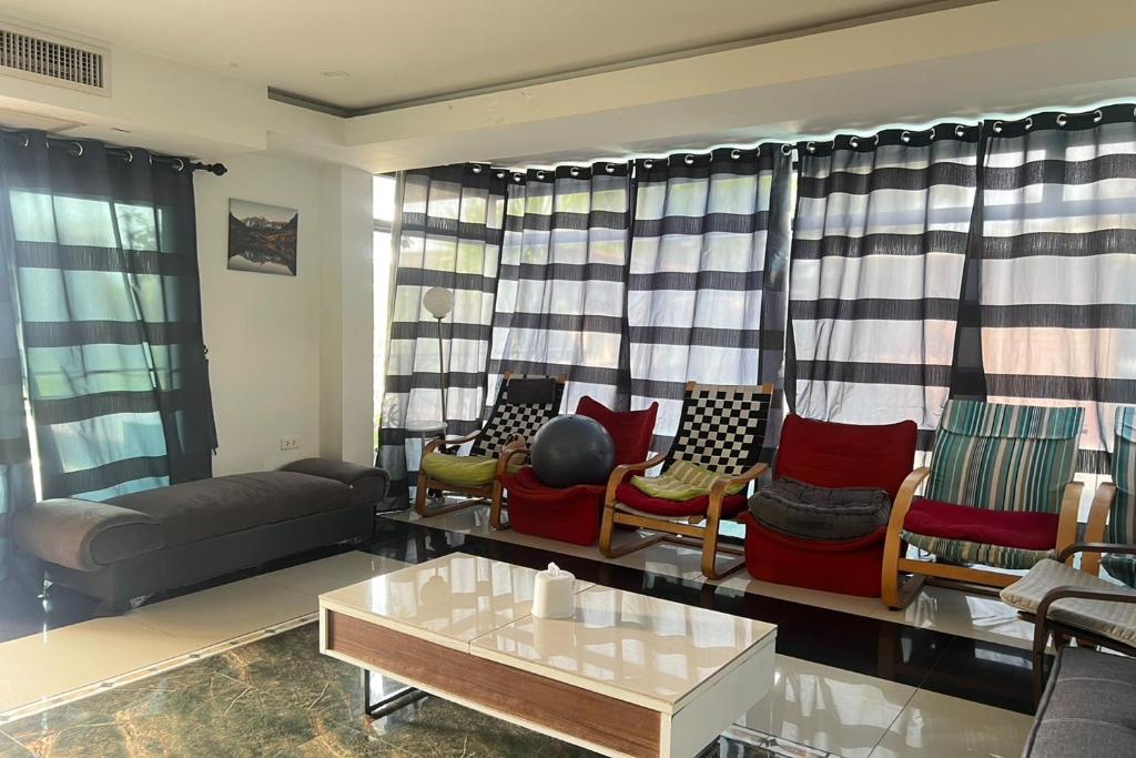 Posezení v ubytování BKL Pool Villa Pattaya