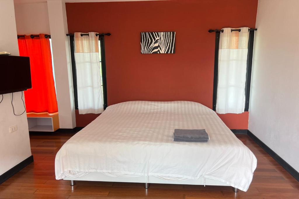 Postel nebo postele na pokoji v ubytování BKL Pool Villa Pattaya