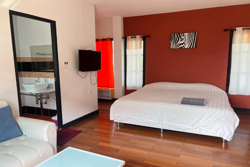 Postel nebo postele na pokoji v ubytování BKL Pool Villa Pattaya