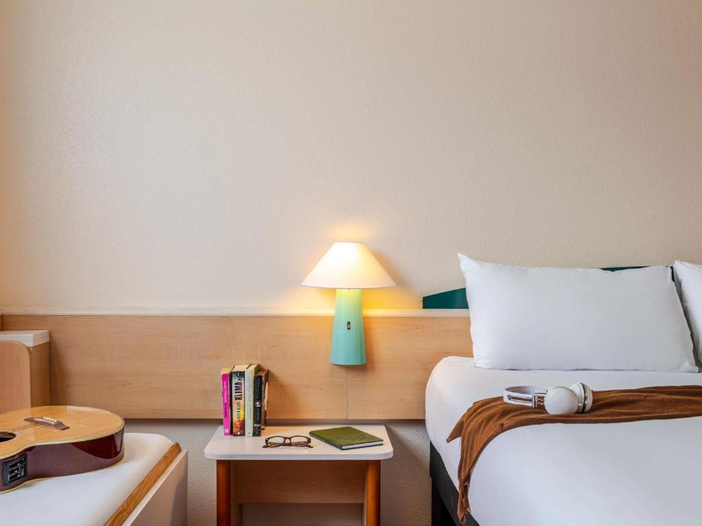 Postel nebo postele na pokoji v ubytování Ibis Bilbao Barakaldo