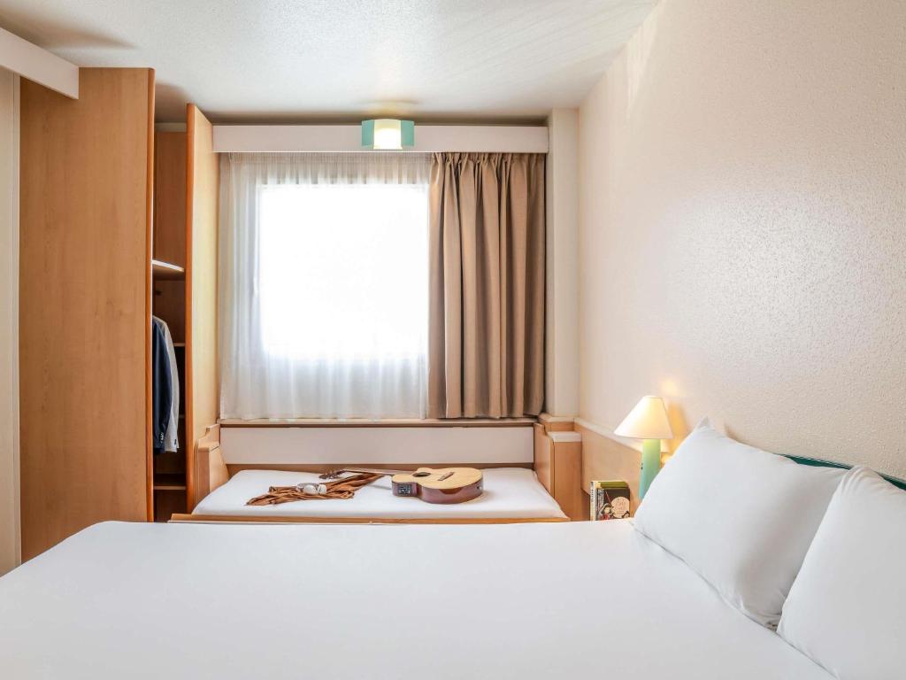 Postel nebo postele na pokoji v ubytování Ibis Bilbao Barakaldo