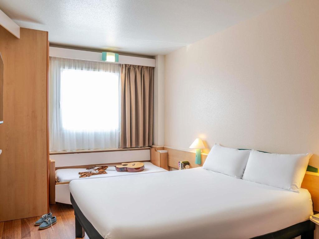 Postel nebo postele na pokoji v ubytování Ibis Bilbao Barakaldo