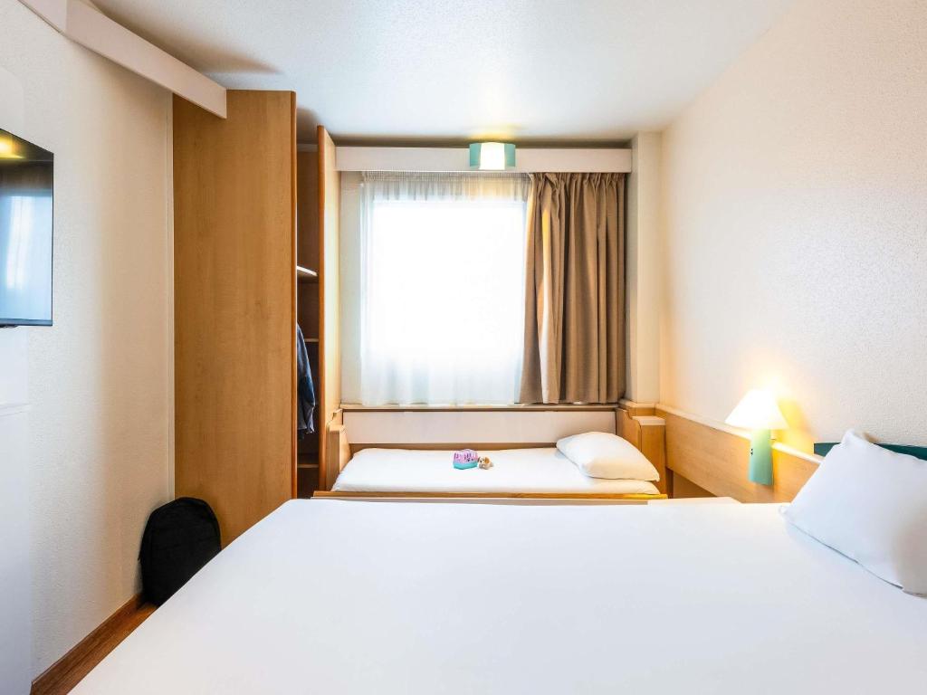 Postel nebo postele na pokoji v ubytování Ibis Bilbao Barakaldo