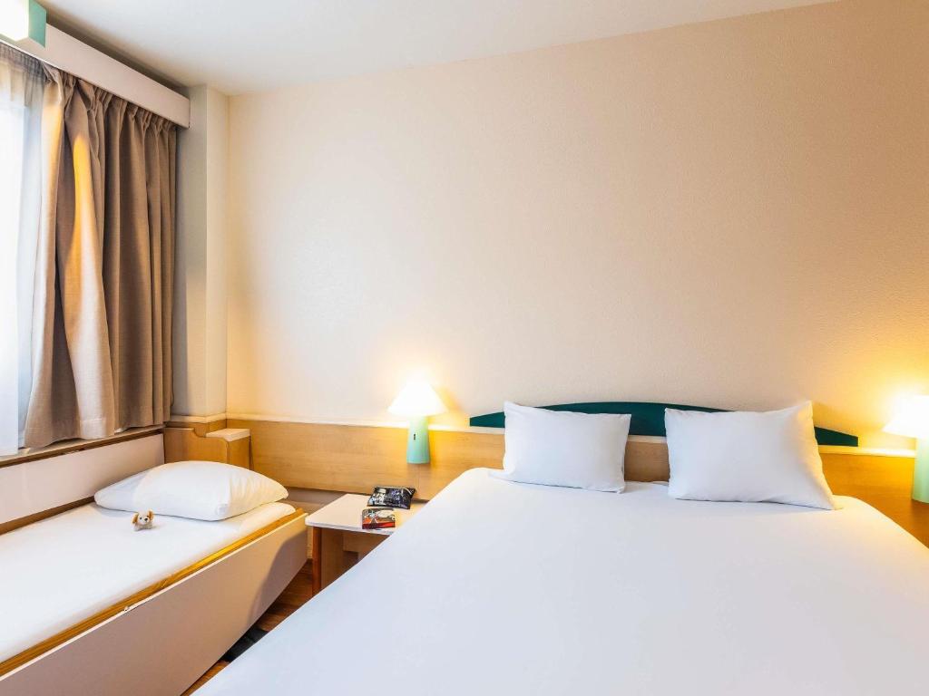 Postel nebo postele na pokoji v ubytování Ibis Bilbao Barakaldo