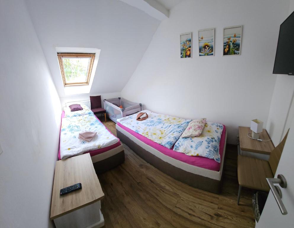 Postel nebo postele na pokoji v ubytování Bluestars Home
