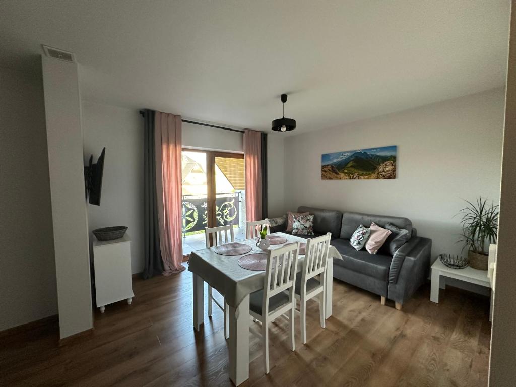 Posedenie v ubytovaní Apartamenty u Moni
