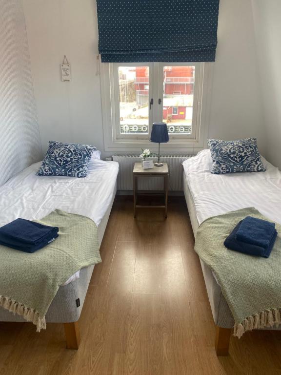 Postel nebo postele na pokoji v ubytování Pensionat bryggan
