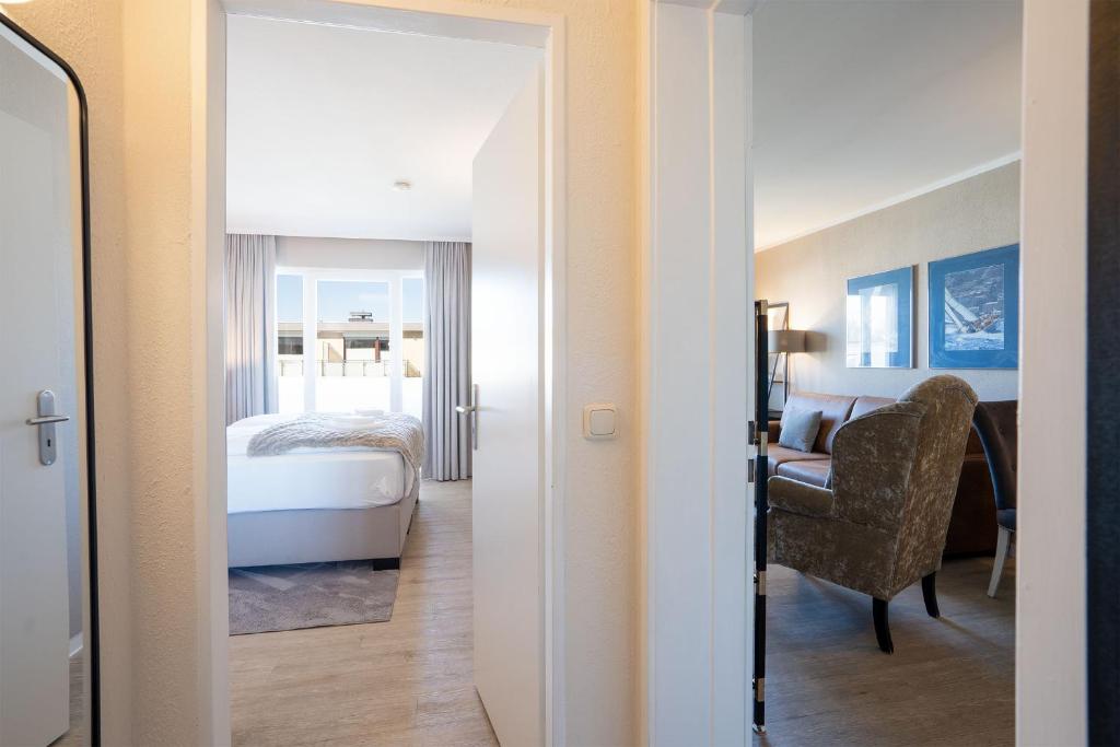 Postel nebo postele na pokoji v ubytování Das Solaris 10 Luxury Beach Apartment mit Balkon, hundefreundlich, individuell