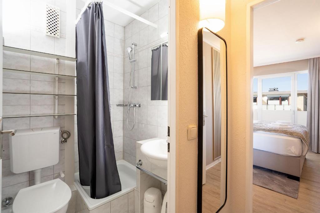 Koupelna v ubytování Das Solaris 10 Luxury Beach Apartment mit Balkon, hundefreundlich, individuell