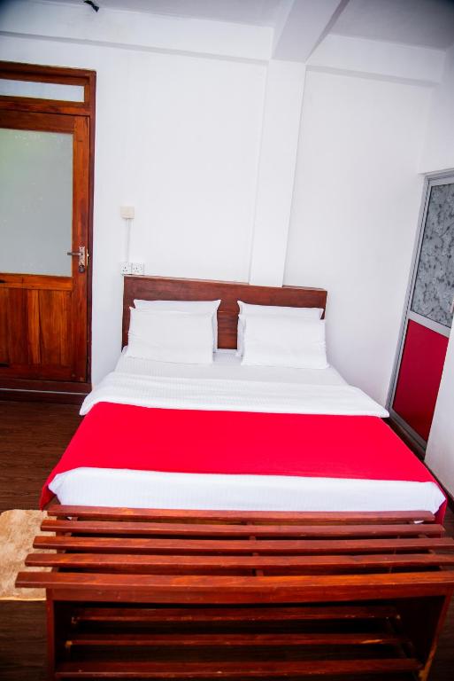 Postel nebo postele na pokoji v ubytování Minthu Homestay