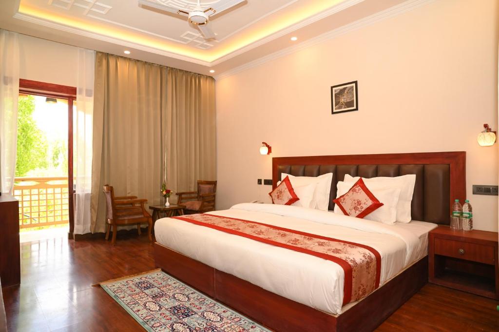 Postel nebo postele na pokoji v ubytování Hotel Ladakh Hills