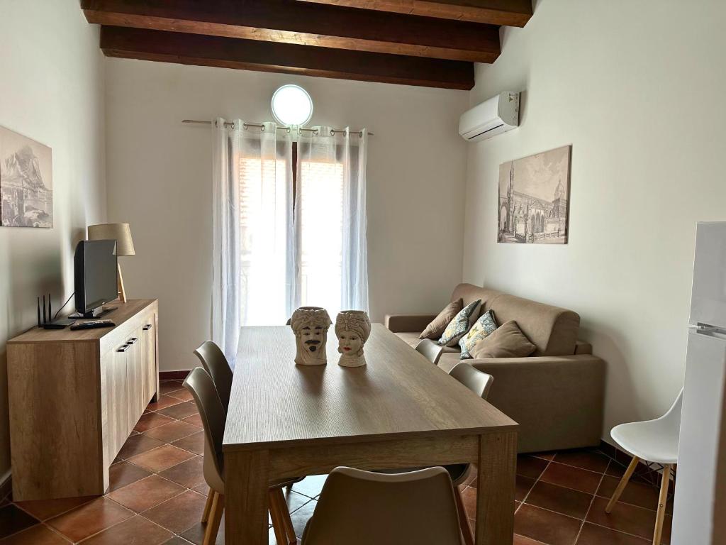 Televízia a/alebo spoločenská miestnosť v ubytovaní Appartamenti-Residence Al Massimo