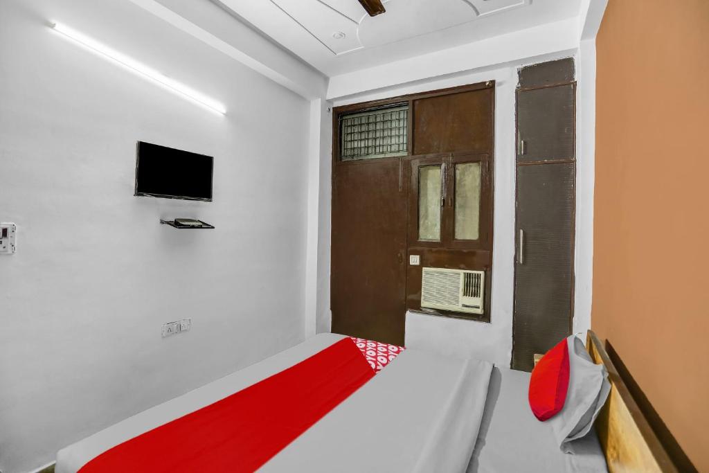 TV a/nebo společenská místnost v ubytování Super Hotel O Satguru Residency