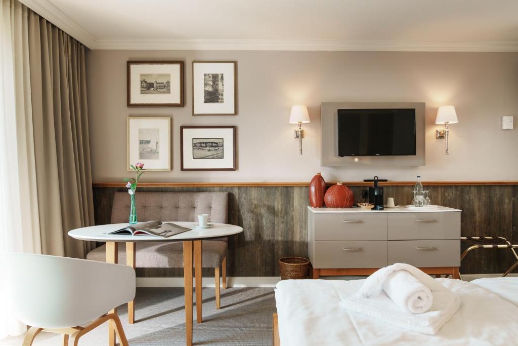 TV a/nebo společenská místnost v ubytování Hotel Meersinn - Binz