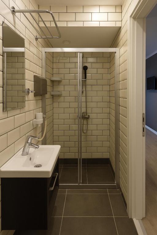 Koupelna v ubytování Utarit Hotel
