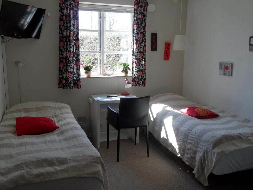 Postel nebo postele na pokoji v ubytování Motel Herning