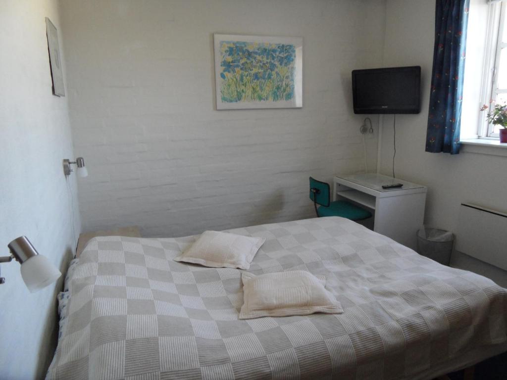 Postel nebo postele na pokoji v ubytování Motel Herning