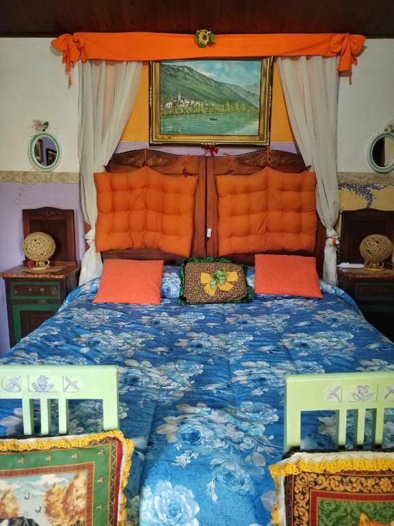 Posteľ alebo postele v izbe v ubytovaní Art B&B La Casa del Pittore
