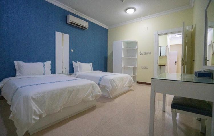 Postel nebo postele na pokoji v ubytování Open Hotel Buraiyda