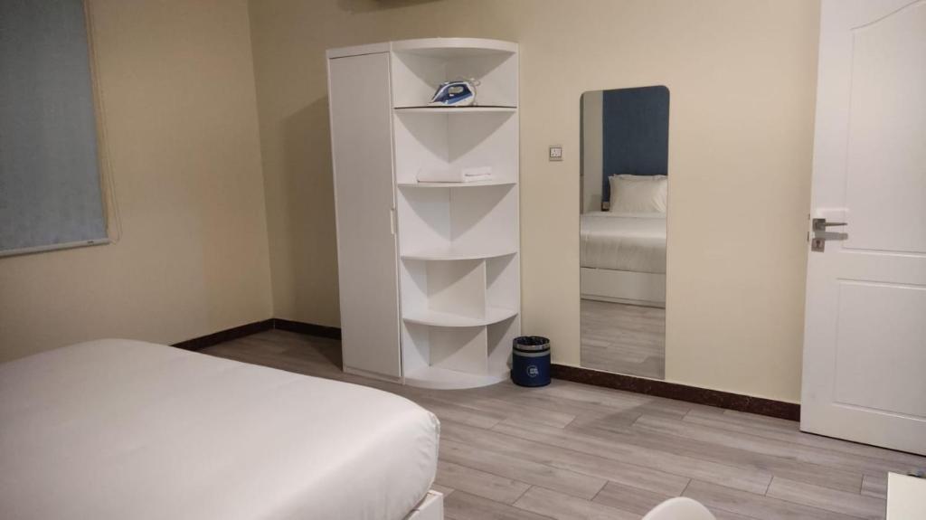Postel nebo postele na pokoji v ubytování Open Hotel Buraiyda