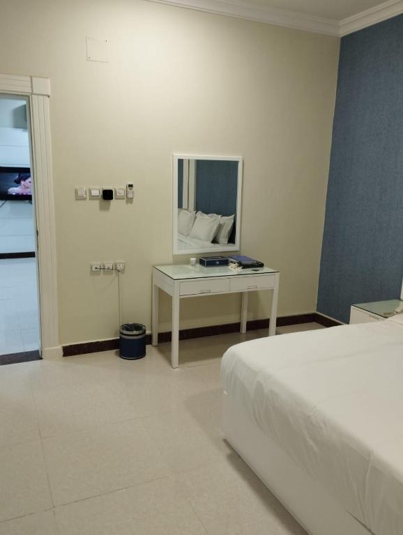 TV a/nebo společenská místnost v ubytování Open Hotel Buraiyda