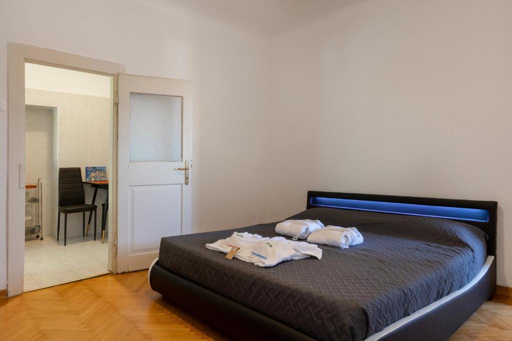 Postel nebo postele na pokoji v ubytování Vista&Capriccio