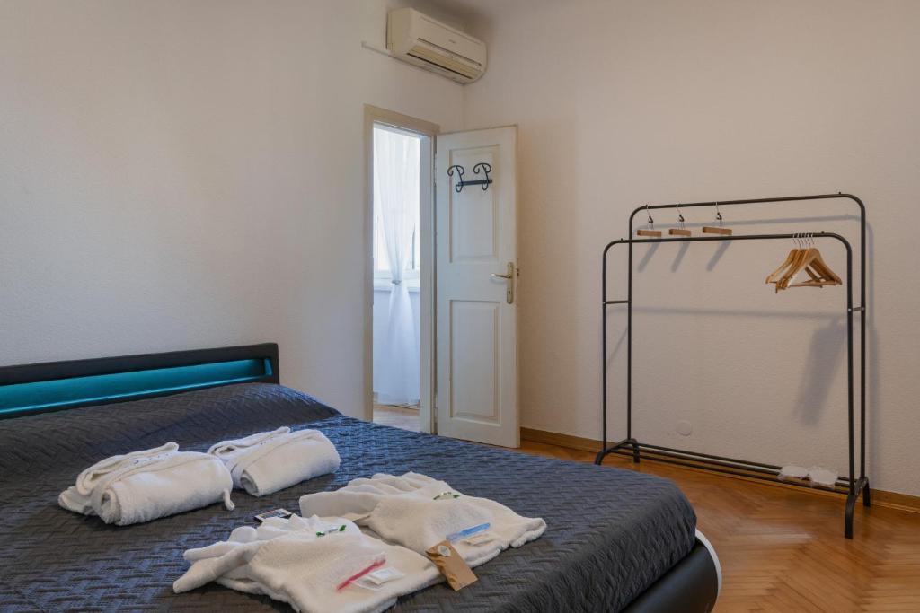Postel nebo postele na pokoji v ubytování Vista&Capriccio