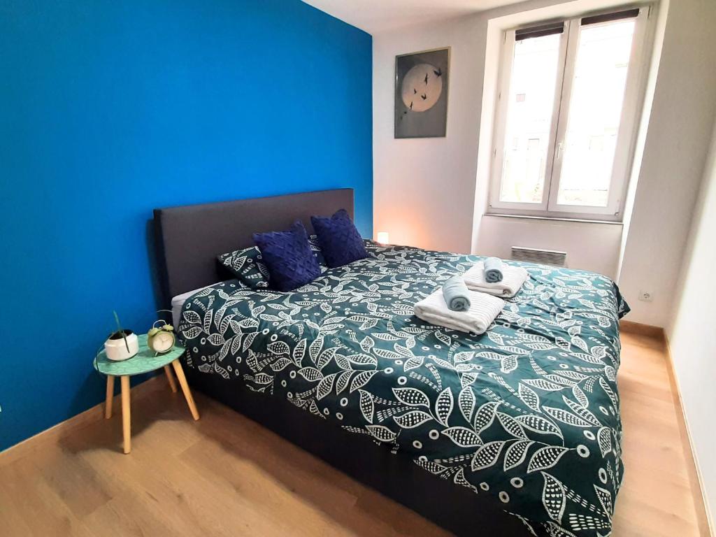 Postel nebo postele na pokoji v ubytování L'Échappée douce, central et lumineux