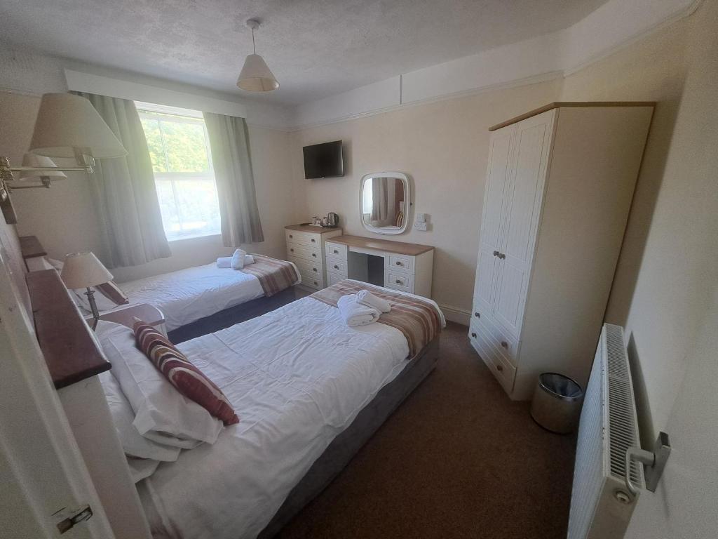 Lion Hotel & Studio Apartments - Chambre Familiale