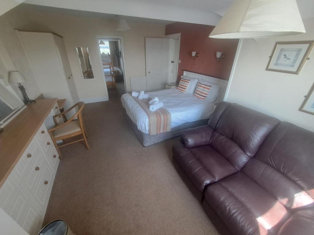Lion Hotel & Studio Apartments - Chambre Familiale