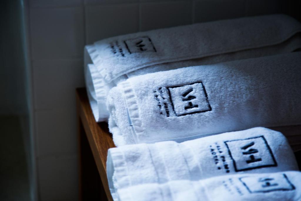 Postel nebo postele na pokoji v ubytování Villa Prime Hotel