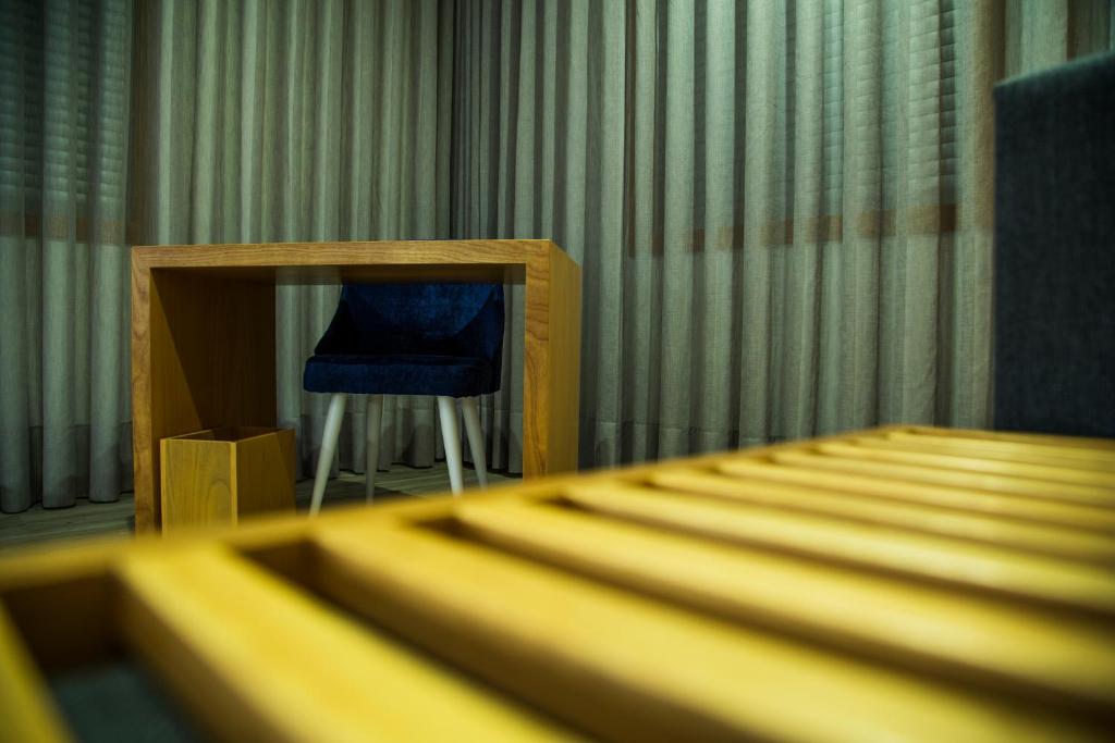 TV a/nebo společenská místnost v ubytování Villa Prime Hotel