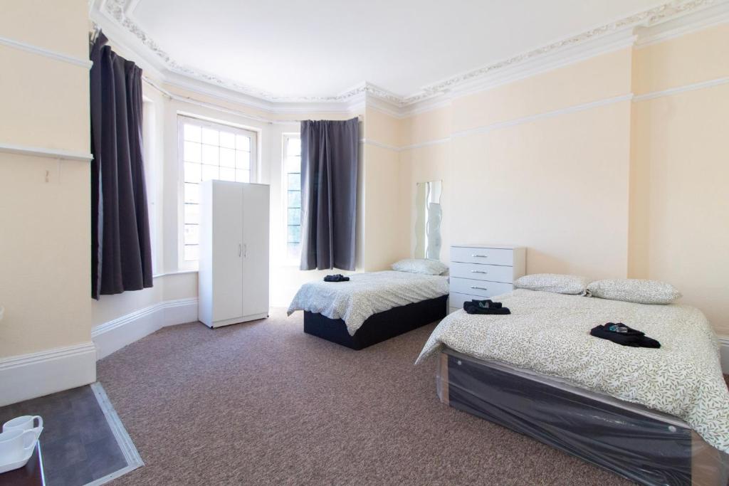 Ένα ή περισσότερα κρεβάτια σε δωμάτιο στο Brookvale Guest House Room 1
